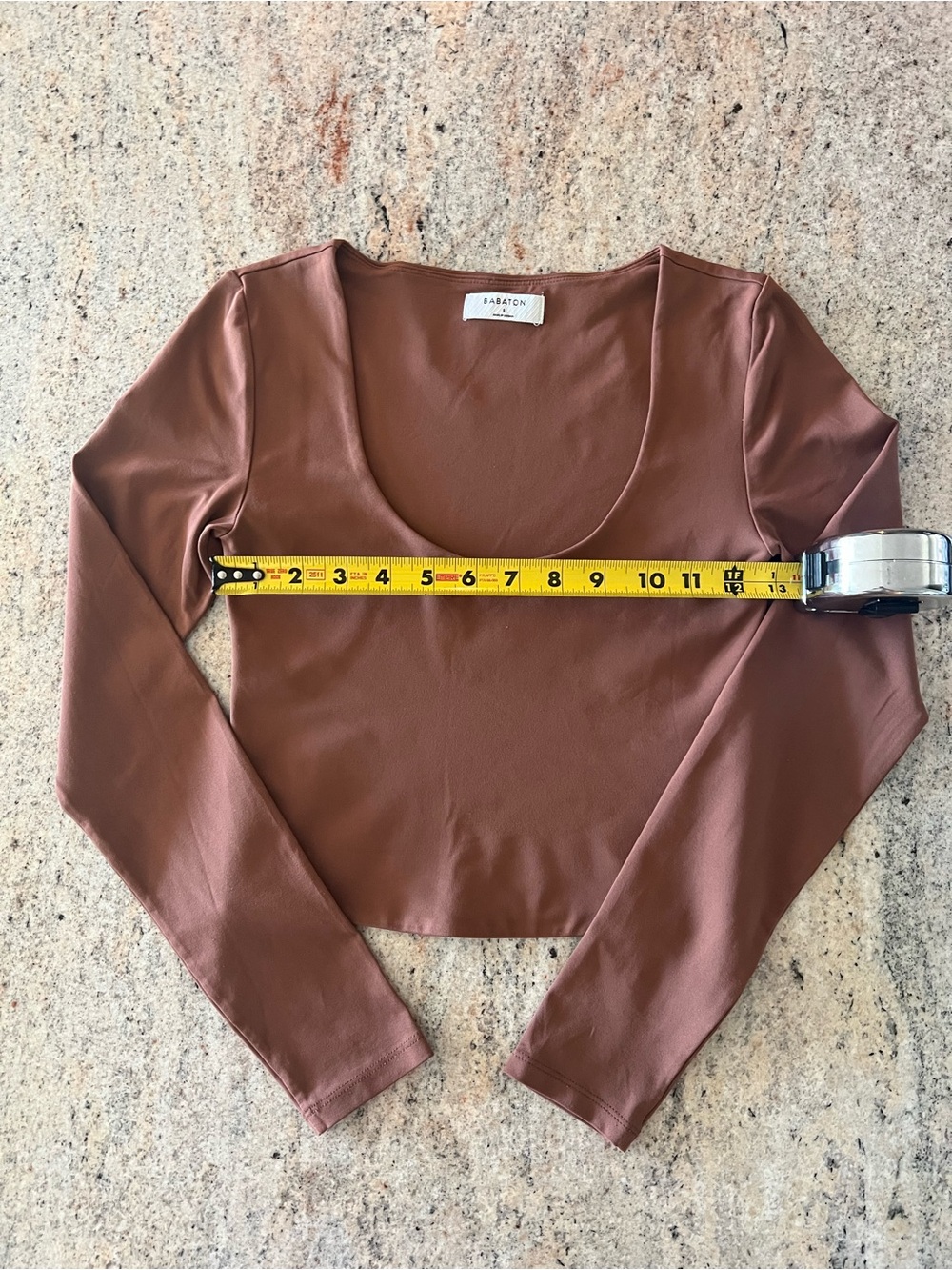 Aritzia’s Babaton Long Sleeve Scoop Neck Crop Top - Rust